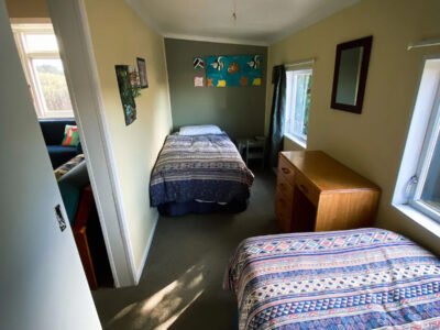 Seabury Lookout – Classic Kiwi Bach with Views suitable for all ages and stages!