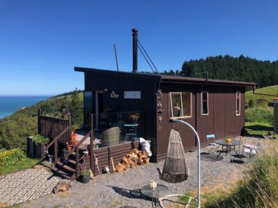 Cosy Coastal Bach with Ocean Views – Close to Gore Bay