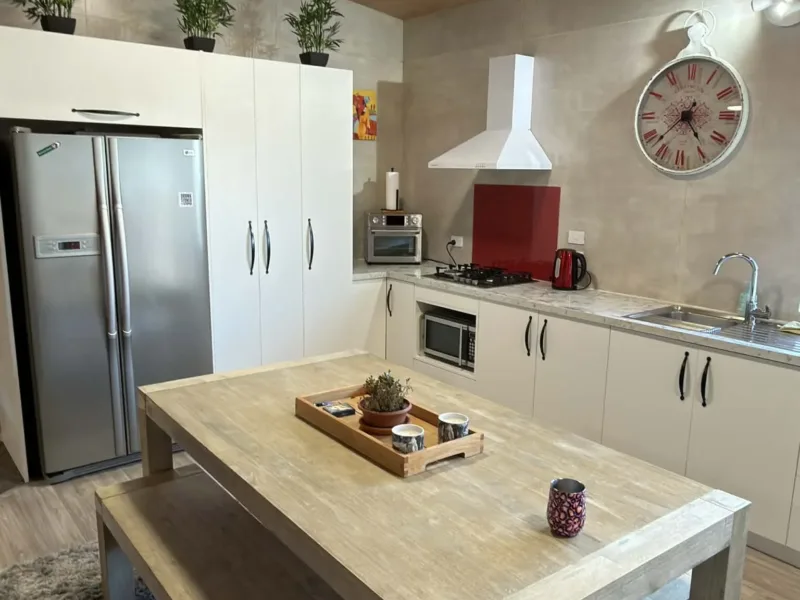 Waitarere peaceful 2 bedroom rustic bach with Spa Pool