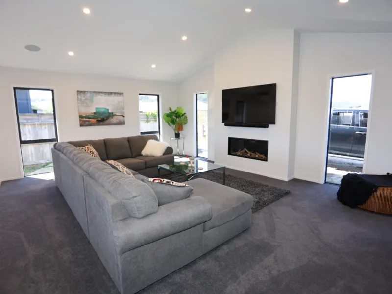 Modern Coastal home with large covered outdoor entertaining area in Cooks Beach