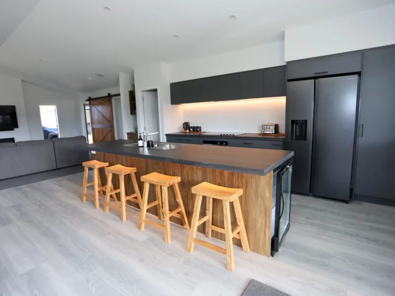 Modern Coastal home with large covered outdoor entertaining area in Cooks Beach